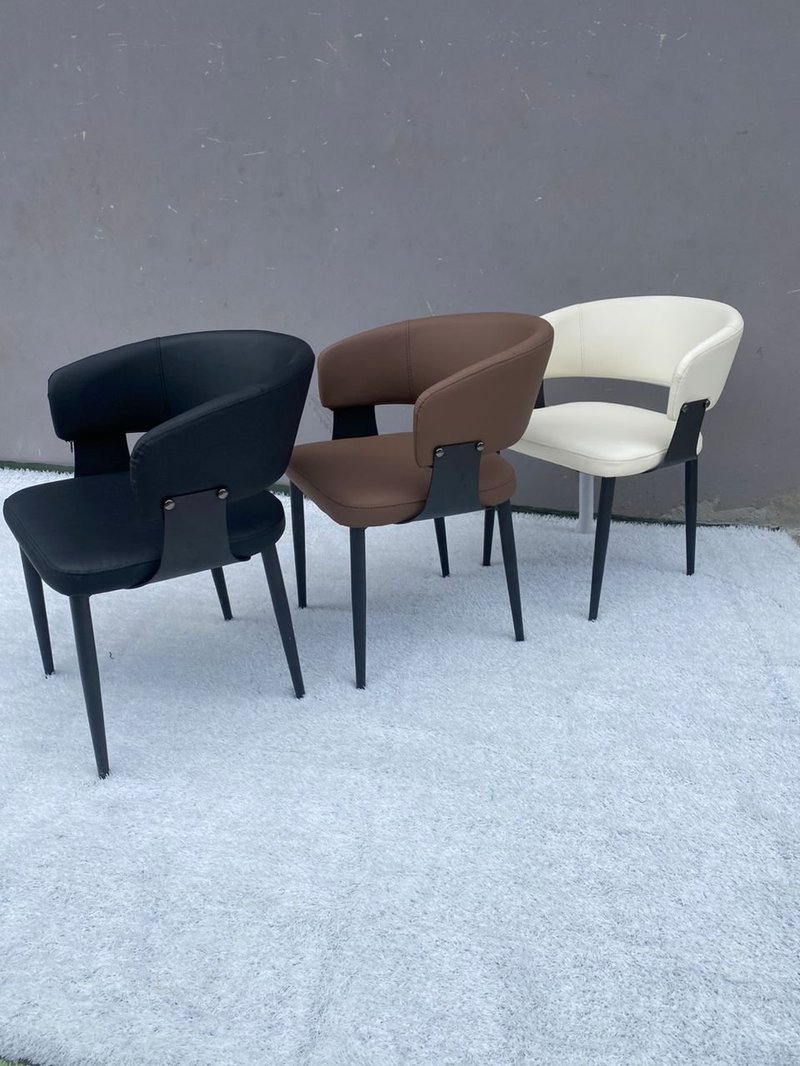 Modern Ergonomic Curved Leatherette Dining Chair with Accent Bracket Back - Image 1