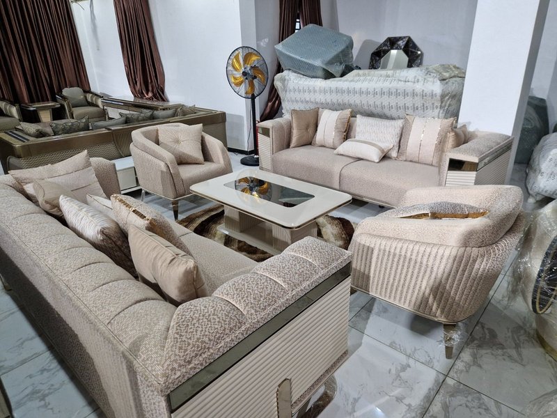 Luxury Champagne Beige Fabric Sofa Set with Gold Accents & Fluted Detailing - Image 1