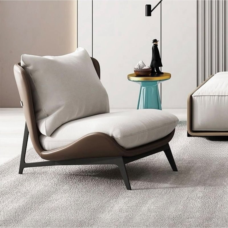 accent chair with textured gray cushion and black angled legs - Image 1