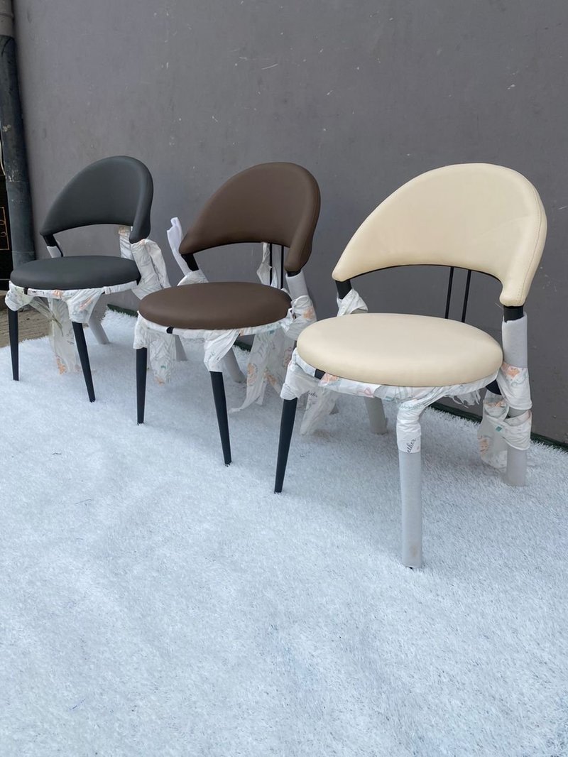 Modern Curved Leatherette Dining Armchair with Open-Back Metal Frame - Image 1