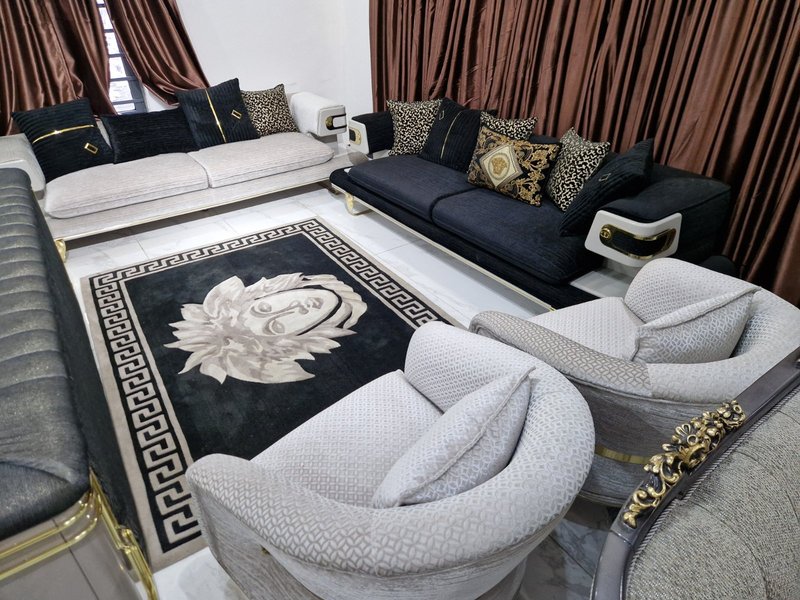 Luxury Black & White Gold-Trimmed Living Room Sofa Set with Sculptural Armchairs